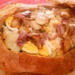Nessa receita, o bacalhau fica muito bom, mas o pão tostado com sabor do alho com azeite é dos deuses! Bacalhau no Pão! 929263f2ca